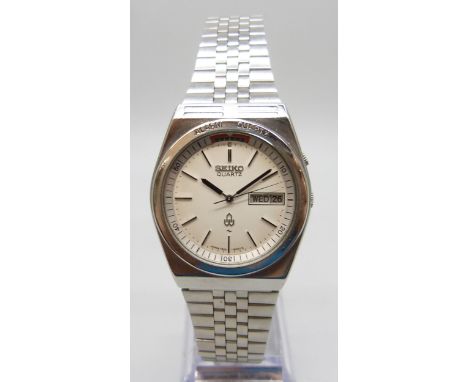 A Seiko Alarm quartz day/date alarm wristwatch, 34mm