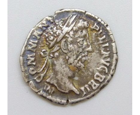 Coins - Ancient Roman silver Denarius of Commodus (177-192) reverse Pietas holding out right hand 
