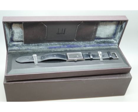A Dunhill tank wristwatch with black dial, stainless steel case fastened with screws, signed case, Dunhill strap and buckle, 