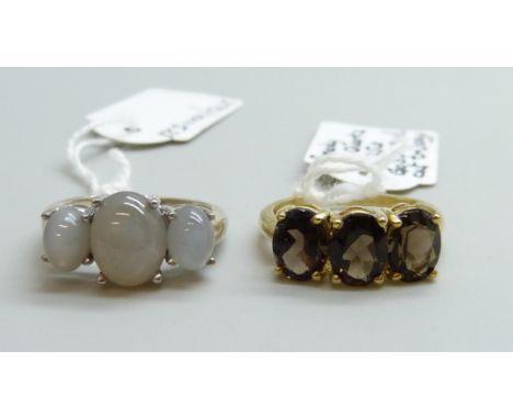 Two sterling silver rings set with titanium moonstone and smoky quartz, both size O