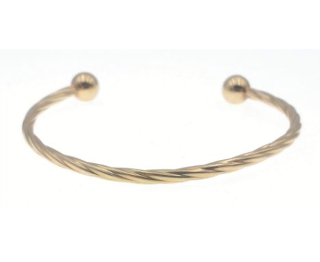 A 9KT stamped yellow gold open bangle width 6cm weight 4.42g approx