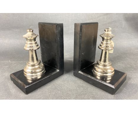 A pair of bookends with white metal rook chess pieces 16x13x9cmApprox 2 pieces