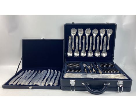 SUISSINE Cutlery set. Beautiful unused, vintage Suissine set in 18/10 mirror polished stainless steel with 22k gold-plated em