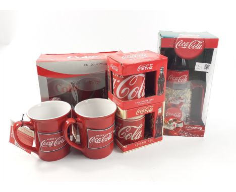 Six pieces of COCA-COLA advertising items to include boxed as new chiller mug, boxed as new diet cola contour mug and bottle,