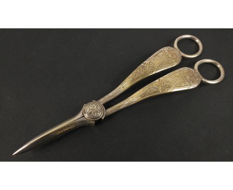 A pair of vintage EPNS grape scissors finely decorated 18cm longApprox 1 pieces