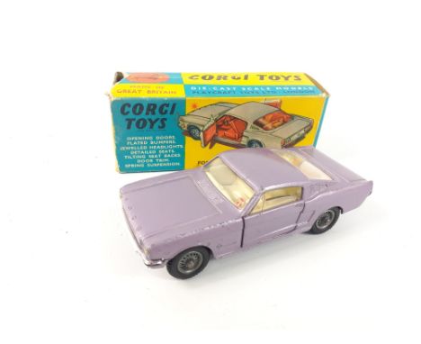 CORGI 320 FORD MUSTANG FASTBACK 2+2 in original box. Lilac finish version in good condition complete with Corgi dog on rear s
