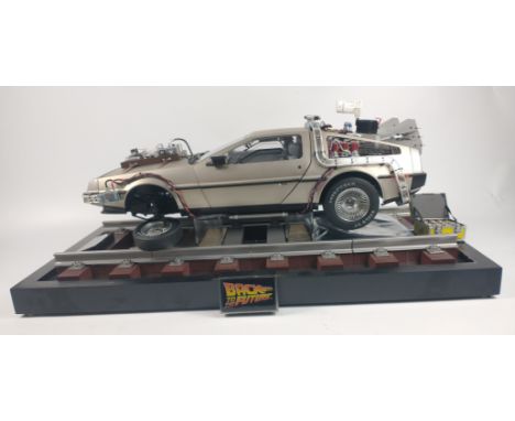 AMAZING EAGLEMOSS Hand built BACK TO THE FUTURE DELOREAN BIG 1/8 scale custom model in perspex case with added rail diorama. 