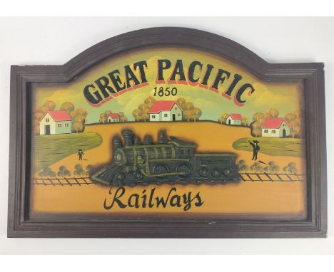 A wooden board advertising 'Great Pacific Railways 1850' with a raised depiction of a steam engine, 60x40cm approxApprox 1 pi