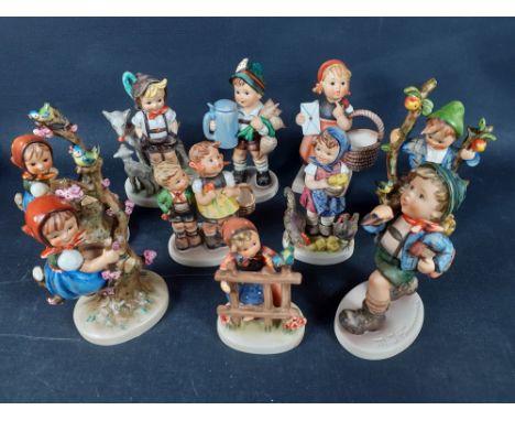 A selection of ten GOEBEL character figurines to include Apple tree boy, (742/1), two apple tree girls (742/1), 1948 child wi