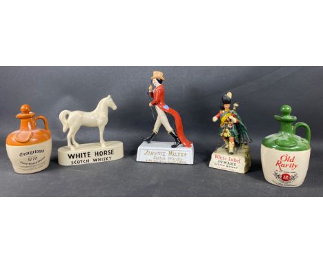 A collection of whisky advertising figurines to include White Label Dewar's Scotch Whisky, Johnnie Walker Scotch Whisky - bor