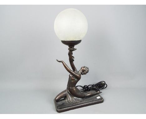 A bronzed Art Deco style figural table lamp, marked 'Crosa 1998', approximately 48 cm (h).