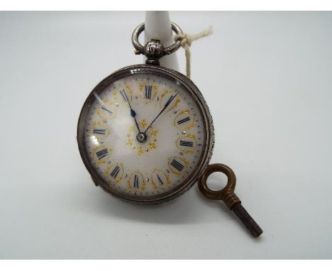 A lady’s silver cased pocket watch, case having engraved decoration, white enamel dial with Roman numerals, gilded decoration