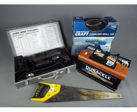 A Black &amp; Decker Professional P80 - 20 Rotary Hammer in case, a Powercraft cordless drill 18v, Duracell automotive batter