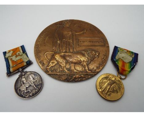 A World War I (WW1) medal group comprising War Medal, Victory Medal and Death Plaque, named to 19399 PTE. J. WHAMOND S. LAN. 