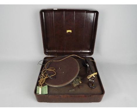 A vintage, bakelite cased Columbia electric record player.