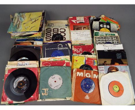 Approximately 130 7" vinyl records to include Bob Dylan, John Lennon, Motown, The Beatles, Rod Stewart, Kate Bush, T-Rex and 