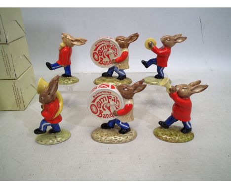 Royal Doulton Bunnykins - Oompah Band. Six/five figures from the Oompah Band collection: 'Sousaphone' (DB23), 'Trumpeter' (DB