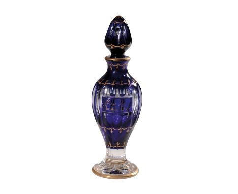 BACCARAT FOR CHRISTIAN DIOR: A 'MISS DIOR' SCENT FLASK the Bohemian style cobalt blue and clear glass bottle and stopper with