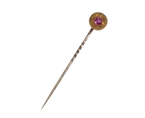 A VICTORIAN NATURAL BURMESE RUBY STICK PIN star set in 18ct yellow gold. Estimated ruby weight: 0.42cts. On a 9ct yellow gold