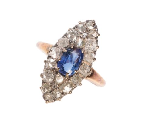 A VICTORIAN DIAMOND AND SAPPHIRE CLUSTER RING, the oval sapphire, surrounded by old-cut diamonds, of lozenge form, on an unma