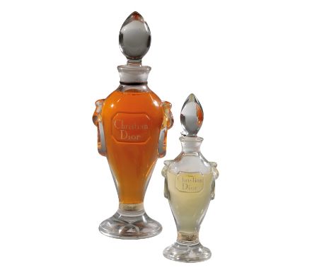 CHRISTIAN DIOR: A 'MISS DIOR' AMPHORA FORM SCENT FLASK apparently still sealed, 20.75cm high; together with a smaller example