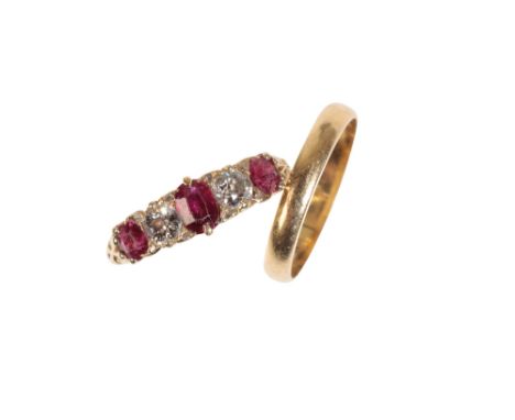 A RUBY AND DIAMOND FIVE STONE RING three oval-cut rubies, divided with two brilliant-cut diamonds, on an unmarked yellow meta