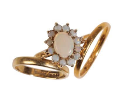 AN OPAL CLUSTER RING AND TWO WEDDING BANDS the opal cluster ring on a 9ct yellow gold shank, together with two gold wedding b