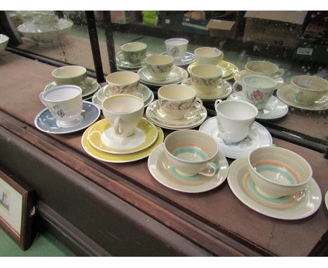 Four Susie Cooper trios and four Susie Cooper tea cups and saucers (8)