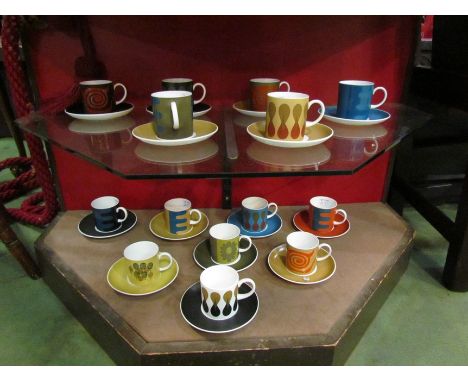 14 Susie Cooper for Wedgwood coffee cans and saucers of varying colours and bold designs