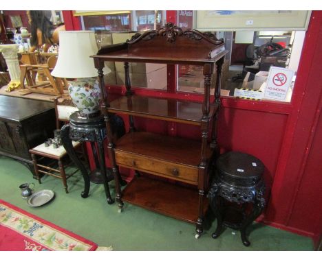 A William IV mahogany set of four tier shelves, the three quarter raised gallery on carved and turned supports with single dr