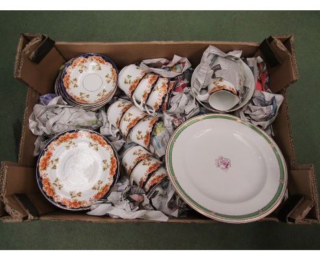 A Royal Stafford tea service, floral decoration with cobalt blue borders together with a Victorian plate with Armorial crest 