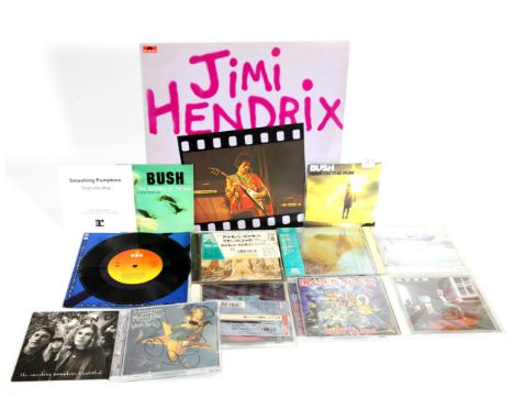 A collection of Mixed Rock Genre CDs, 7" and LP. Includes Japanese releases from Rush, Iron Maiden and Pink Floyd. Plus, Iris