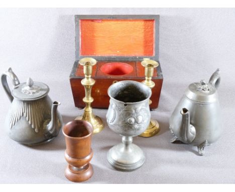 SARCOPHAGUS SHAPED TEA CADDY, treen beaker, three pieces of pewter and a pair of brass candlesticks