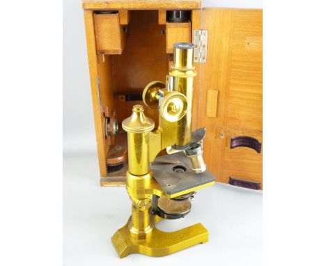 E LEITZ WETZLAR LACQUERED BRASS MICROSCOPE, No 61709, in fitted carry case with additional lenses, slides ETC, signed and num