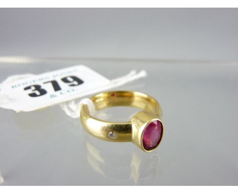 18CT GOLD PINK TOURMALINE SOLITAIRE DRESS RING, the oval faceted tourmaline flanked on either side by a tiny diamond, 7.9 x 6