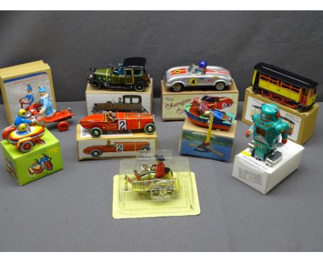 VINTAGE TYPE CLOCKWORK TIN PLATE TOYS (9), mainly vehicle based, one being a small robot