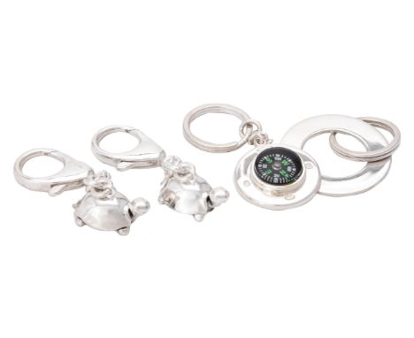 
	
		Four silver keyrings by William &amp; Son (William Rolls Asprey), comprising: two tortoises, London 2016; a slit ring an