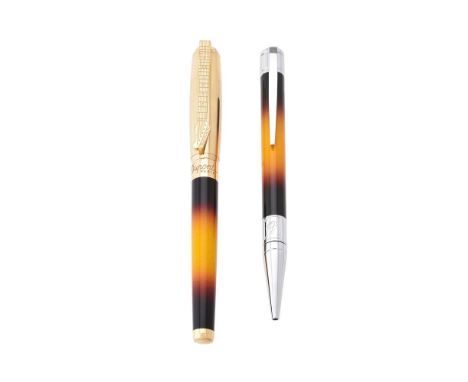 
	
		S. T. Dupont, Fender, a limited edition rollerball pen, no. 0836/1946, the gilt cap with a guitar clip, with a S. T. Dup