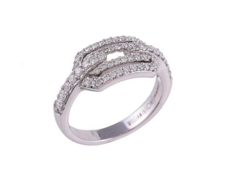 
	
		A white gold diamond dress ring by William &amp; Son, the pierced geometric panel set with brilliant cut diamonds, to ta