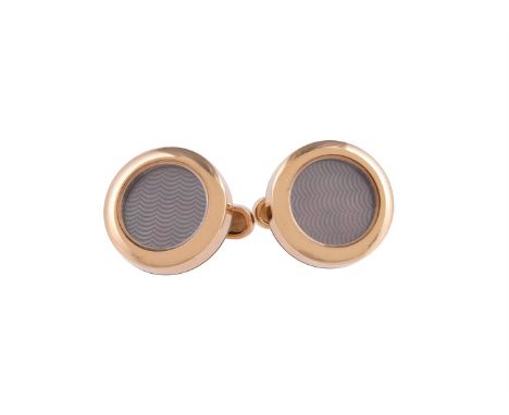 
	
		Y&nbsp;A pair of mother of pearl cufflinks by William &amp; Son, the circular panels centred with an engine turned mothe