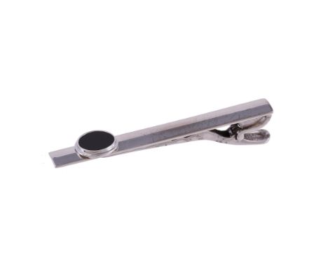 
	
		An onyx tie clip by William &amp; Son, the polished white gold bar with a circular onyx panel, 6cm long, 18 carat gold L