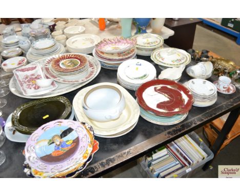 A large quantity of china including meat dishes; a ladle; other plates; glass plates; tureens etc