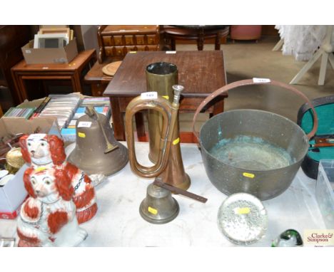 A small brass shell, bugle and bell