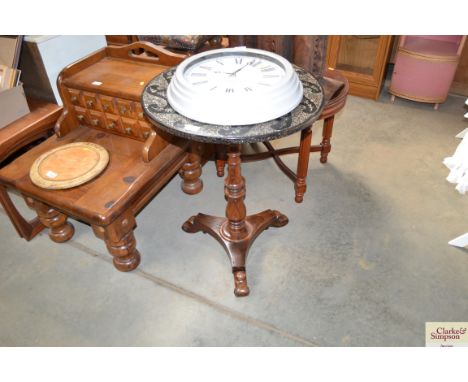 A rose wood and mother of pearl inlaid snap top table 
