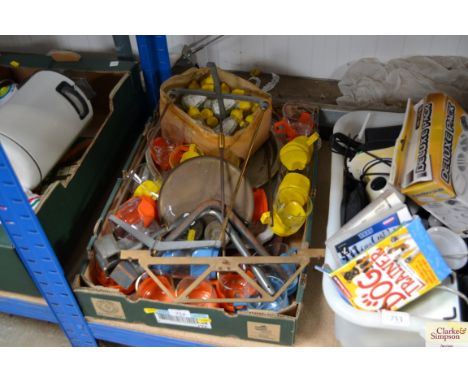 A box containing various cruets, cups, scales etc.