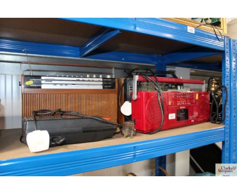 Three vintage radios and a vintage cassette player