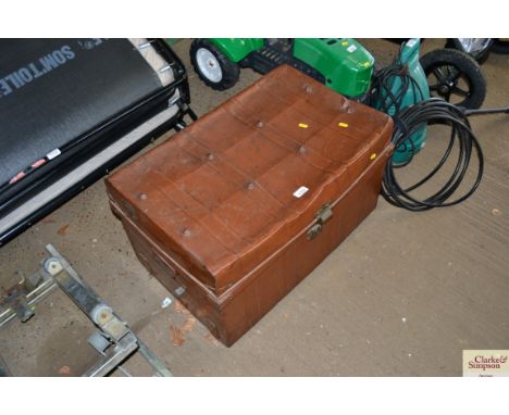 A tin trunk and contents of a few tools