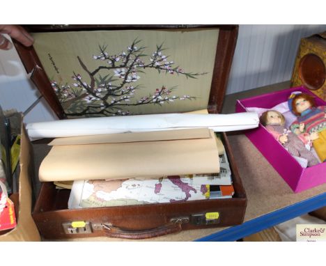 A vintage suitcase of ephemera including WWII posters; a Spitfire poster; programmes; Coronation souvenir etc