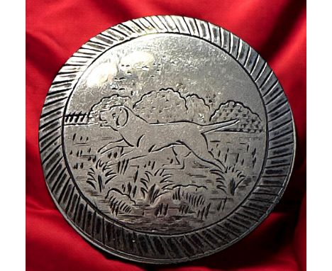 A large engraved early 18th century silver hunting dog button!This is a beautiful example to add to ones collection of an ear