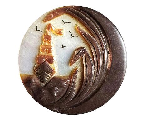 1 Large 19th century carved smokey pearl button. Jean Young of California had two of these very detailed buttons with the hea
